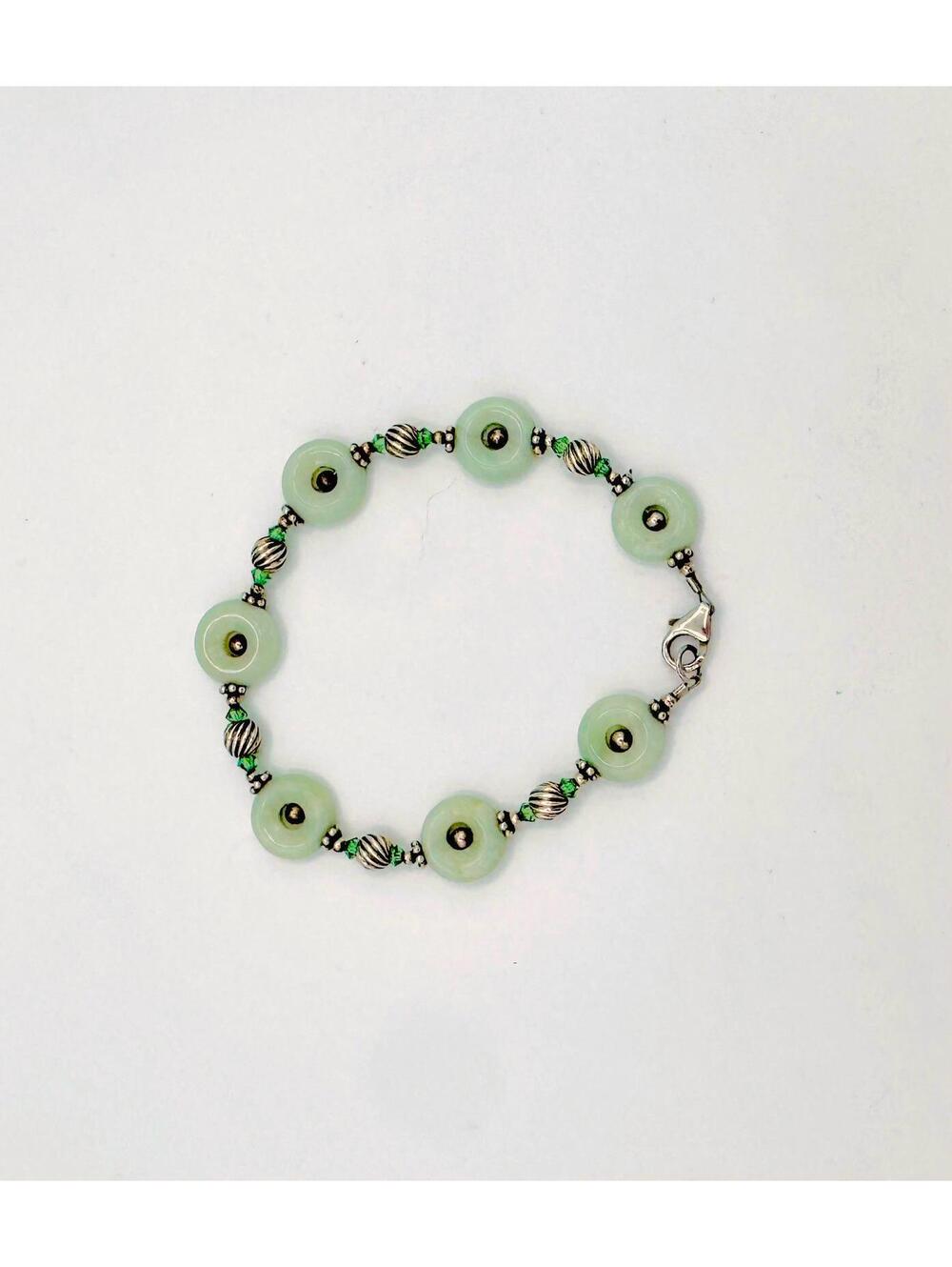 Sterling silver beads with jadeite open disc and silver bead center bracelet